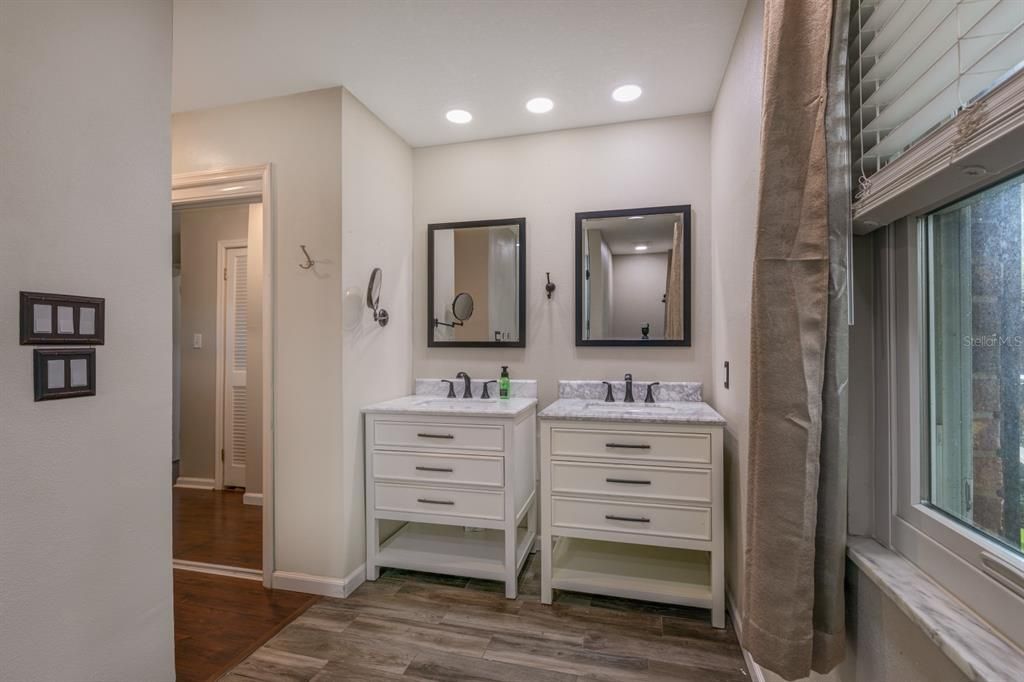 Bathroom, Dual Sink Vanities, Interior, Recessed Lighting, Wood Texture Flooring