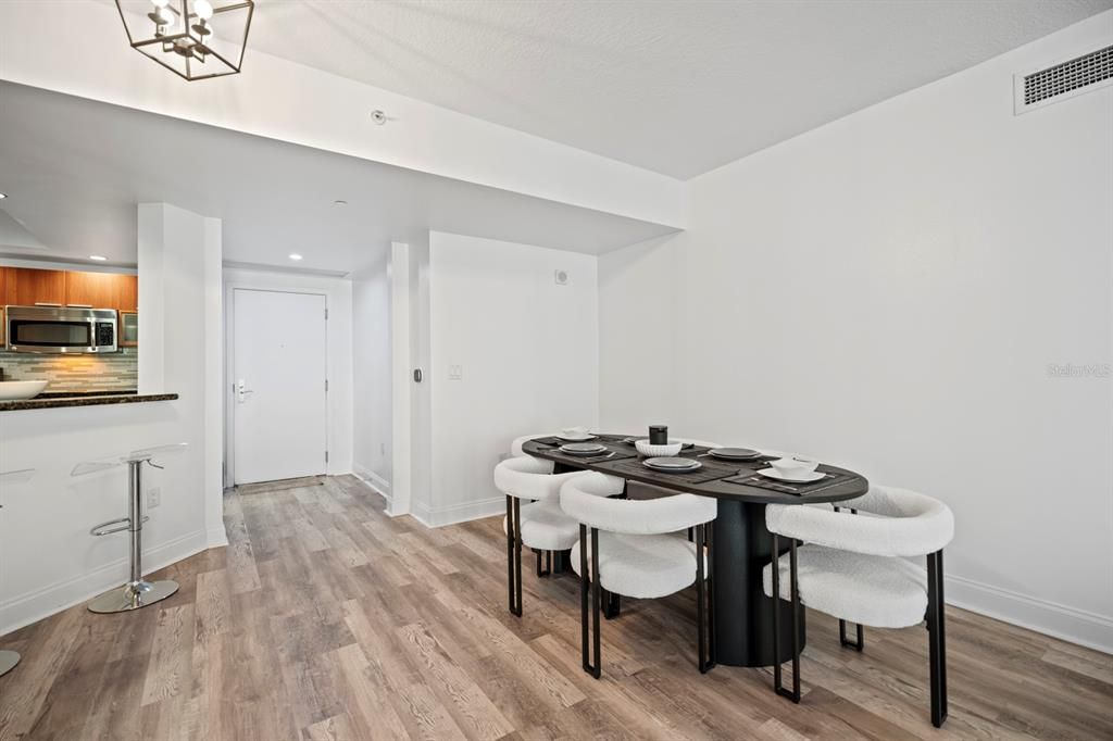 Dining room, Interior, Kitchen, Recessed Lighting, Stainless Steel Appliances, Wood Texture Flooring