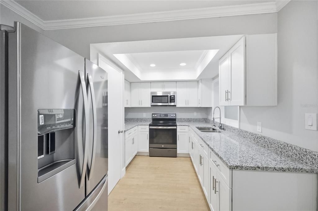 Interior, Kitchen, Recessed Lighting, Stainless Steel Appliances, Wood Texture Flooring