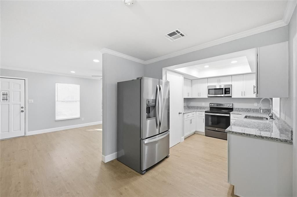 Interior, Kitchen, Recessed Lighting, Stainless Steel Appliances, Wood Texture Flooring