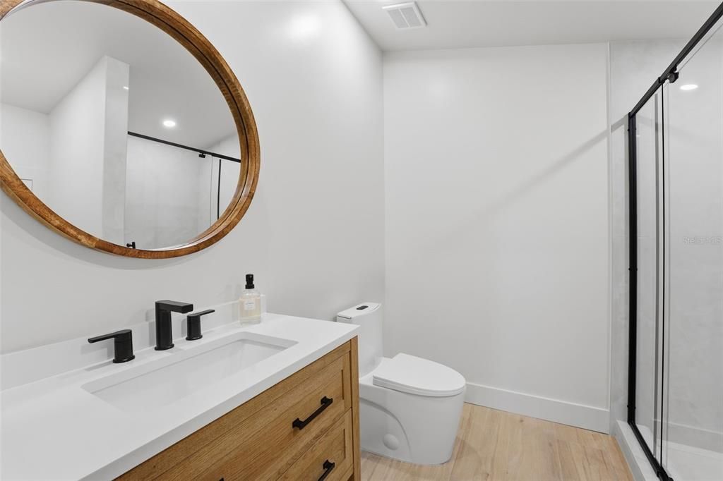 Bathroom, Glass Shower, Interior, Recessed Lighting, Wood Texture Flooring