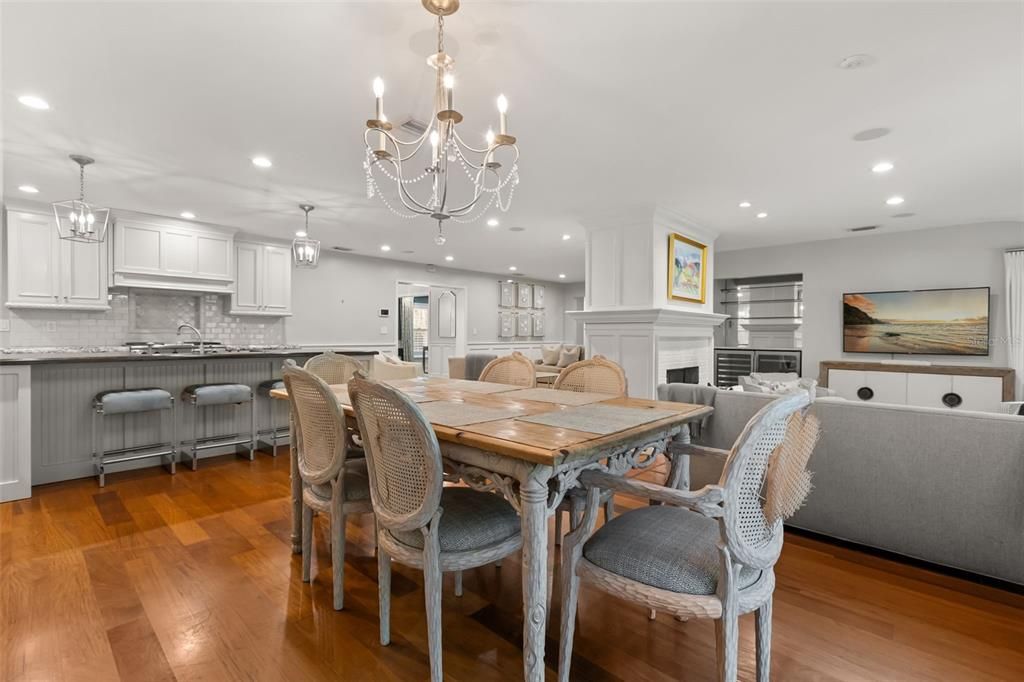 Chandelier, Dining room, Fireplace, Interior, Kitchen, Pendant Lights, Recessed Lighting, Wood Texture Flooring