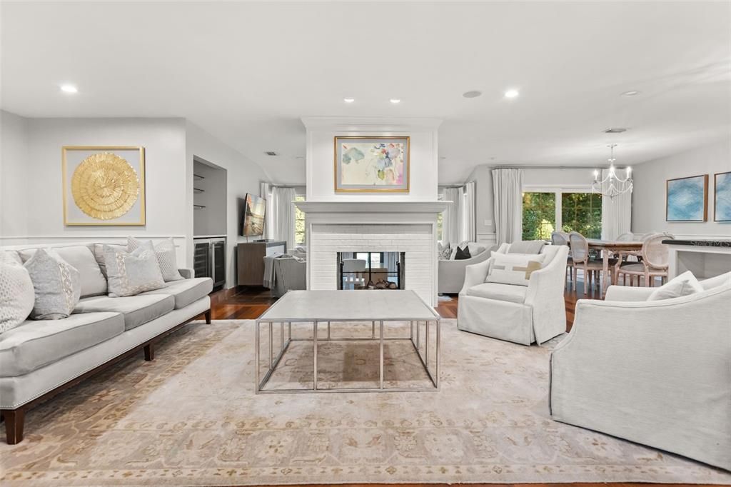 Chandelier, Dining room, Fireplace, Interior, Living room, Recessed Lighting, Wood Texture Flooring