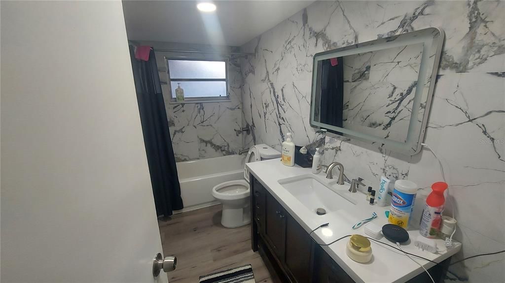 Bathroom, Interior, Marble Walls, Recessed Lighting, Wood Texture Flooring