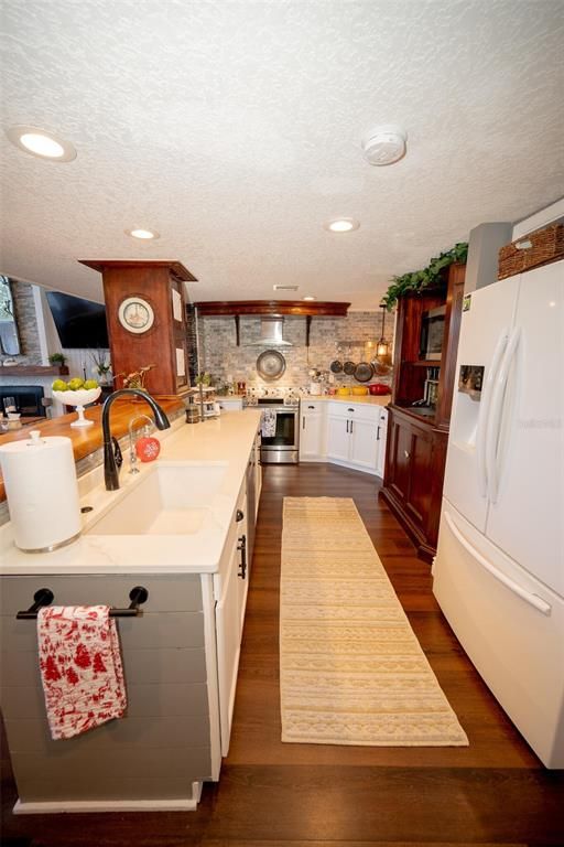 Interior, Kitchen, Recessed Lighting, Stone Walls, Wood Texture Flooring