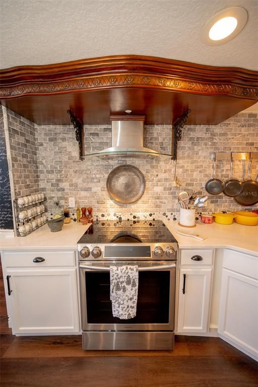 Interior, Kitchen, Recessed Lighting, Stainless Steel Appliances, Stone Walls, Wood Texture Flooring