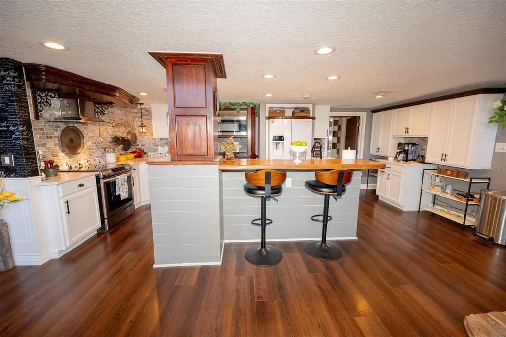 Interior, Kitchen, Recessed Lighting, Stainless Steel Appliances, Stone Walls, Wood Texture Flooring