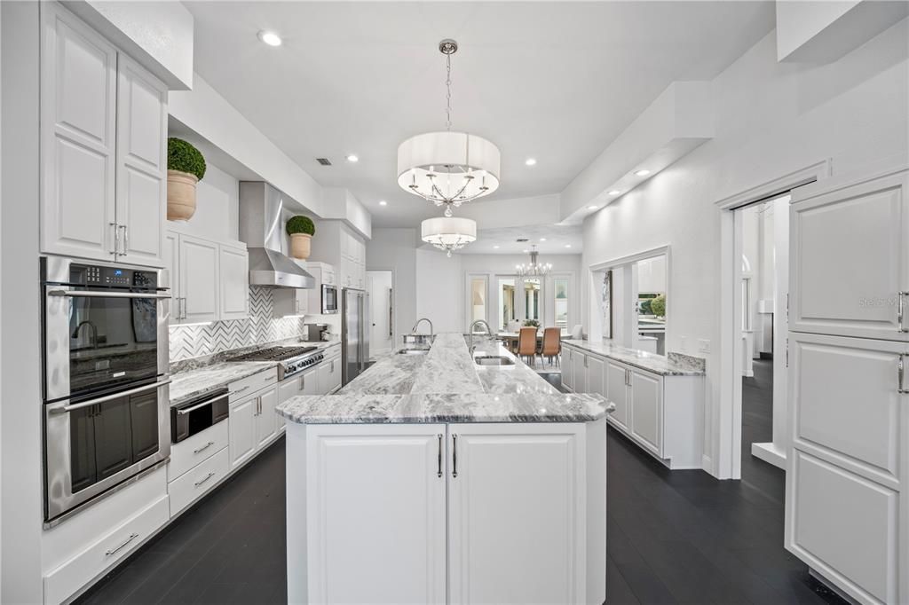 Chandelier, Interior, Kitchen, Pendant Lights, Recessed Lighting, Stainless Steel Appliances, Wood Texture Flooring