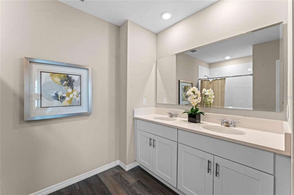 Bathroom, Dual Sink Vanities, Interior, Recessed Lighting, Wood Texture Flooring
