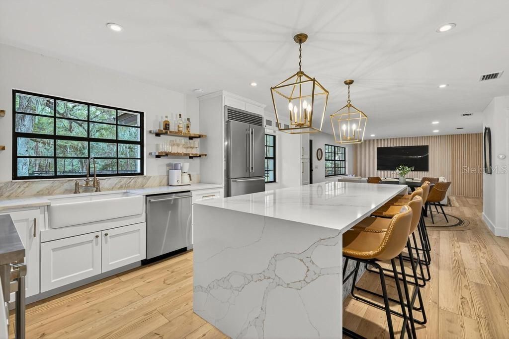 Dining room, Interior, Kitchen, Pendant Lights, Recessed Lighting, Stainless Steel Appliances, Wood Texture Flooring