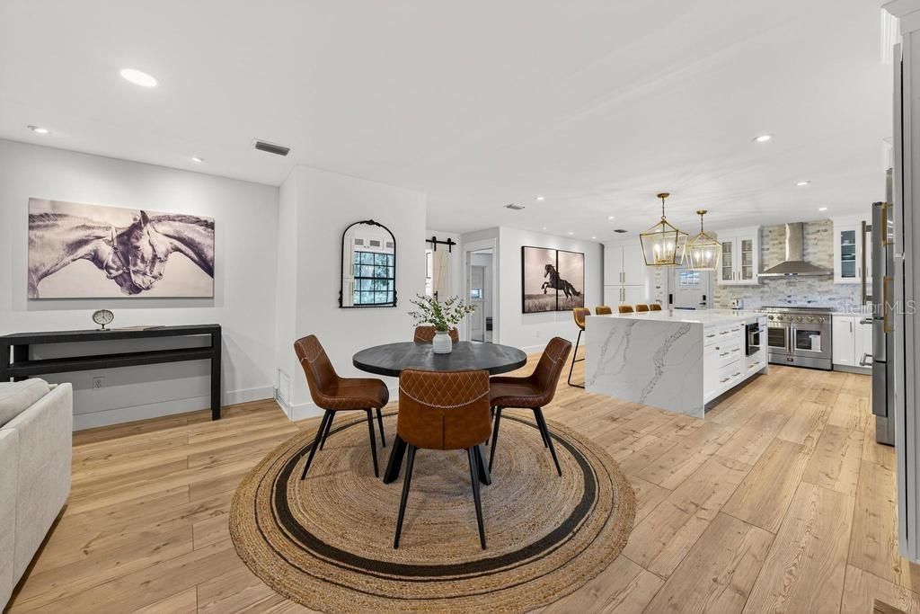 Dining room, Interior, Kitchen, Pendant Lights, Recessed Lighting, Stainless Steel Appliances, Wood Texture Flooring
