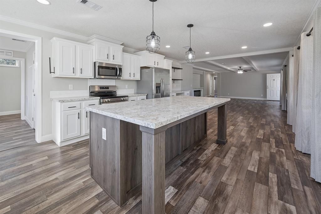 Interior, Kitchen, Pendant Lights, Recessed Lighting, Stainless Steel Appliances, Wood Texture Flooring
