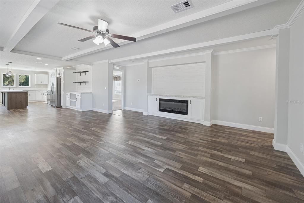 Empty room, Fireplace, Interior, Recessed Lighting, Wood Texture Flooring