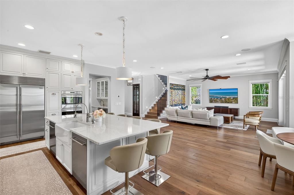 Dining room, Interior, Kitchen, Living room, Pendant Lights, Recessed Lighting, Stainless Steel Appliances, Wood Texture Flooring