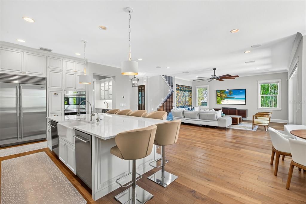 Dining room, Interior, Kitchen, Living room, Pendant Lights, Recessed Lighting, Stainless Steel Appliances, Wood Texture Flooring