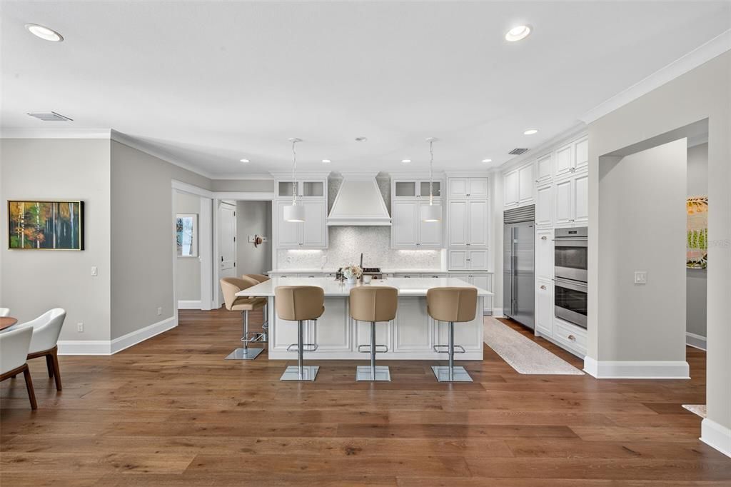 Dining room, Interior, Kitchen, Pendant Lights, Recessed Lighting, Stainless Steel Appliances, Wood Texture Flooring