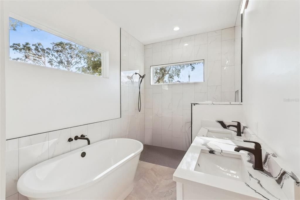 Bathroom, Dual Sink Vanities, Free Standing Baths, Glass Shower, Interior, Marble Walls, Recessed Lighting