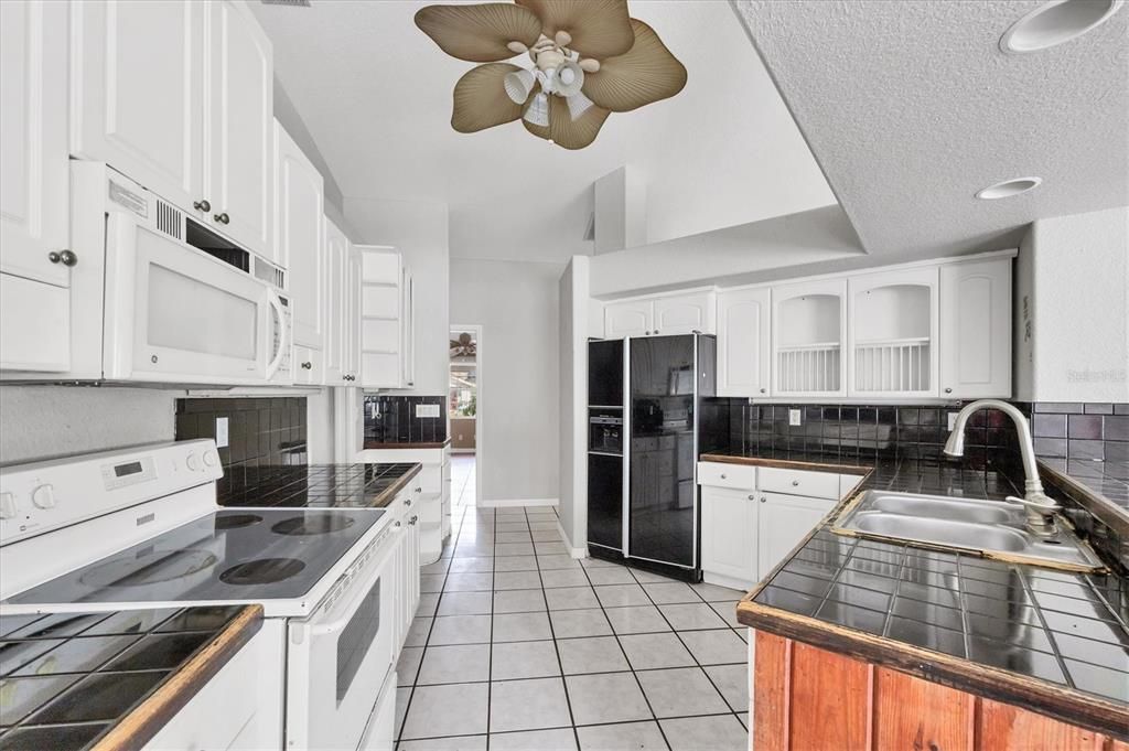 Interior, Kitchen, Recessed Lighting, Tile Countertops