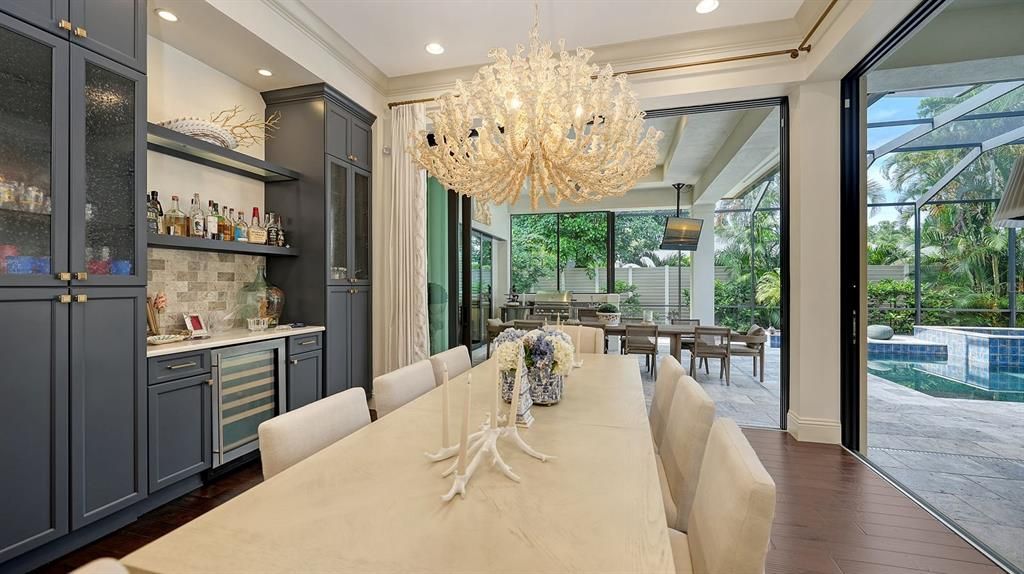 Chandelier, Dining room, Interior, Pool, Recessed Lighting, Sun Room, Wood Texture Flooring