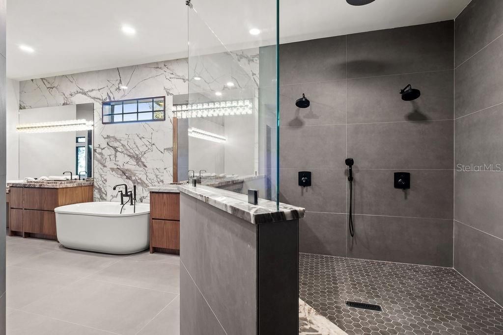 Bathroom, Dual Sink Vanities, Free Standing Baths, Glass Shower, Interior, Marble Walls, Recessed Lighting