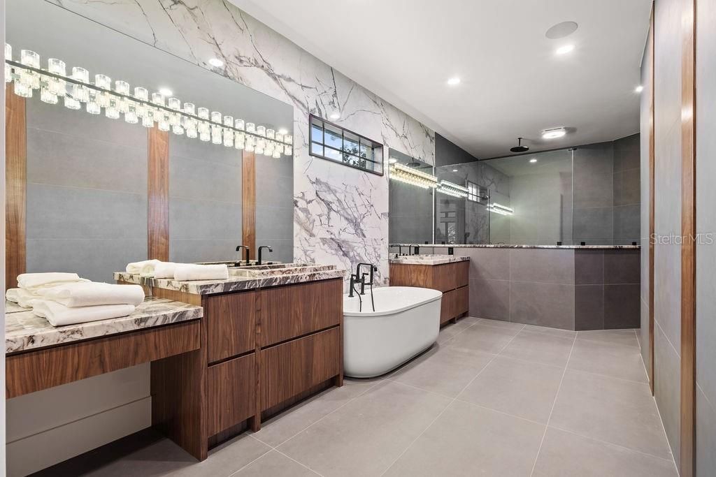 Bathroom, Dual Sink Vanities, Free Standing Baths, Glass Shower, Interior, Marble Walls, Recessed Lighting