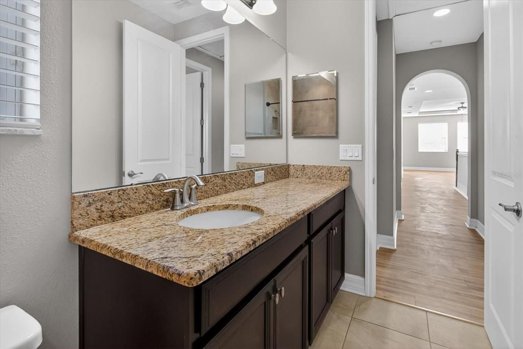 Bathroom, Dual Sink Vanities, Interior, Recessed Lighting, Wood Texture Flooring