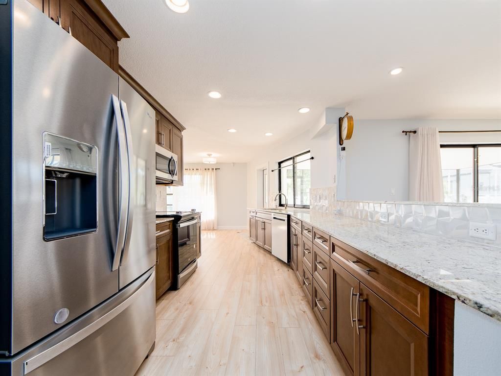 Interior, Kitchen, Recessed Lighting, Stainless Steel Appliances, Wood Texture Flooring