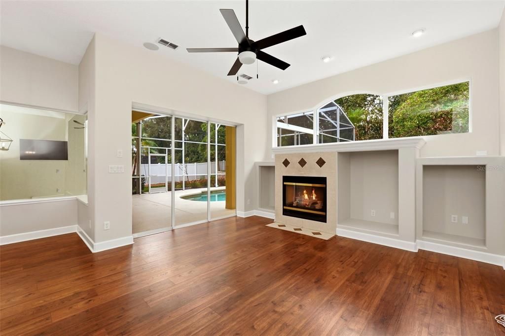 Empty room, Fireplace, Interior, Recessed Lighting, Wood Texture Flooring