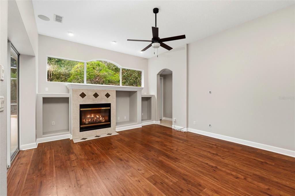 Empty room, Fireplace, Interior, Recessed Lighting, Wood Texture Flooring