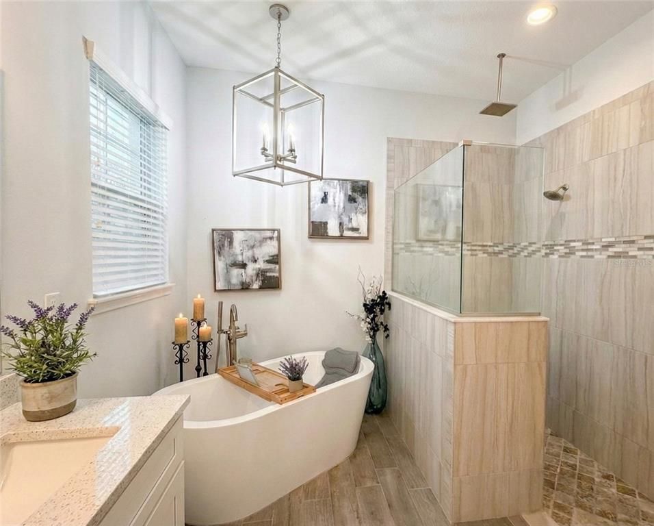 Bathroom, Free Standing Baths, Glass Shower, Interior, Pendant Lights, Recessed Lighting, Wood Texture Flooring