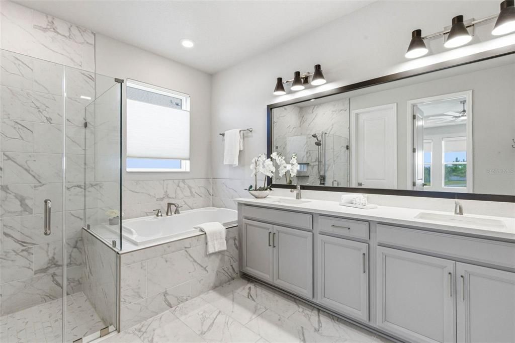 Bathroom, Dual Sink Vanities, Glass Shower, Interior, Marble, Marble Walls, Recessed Lighting