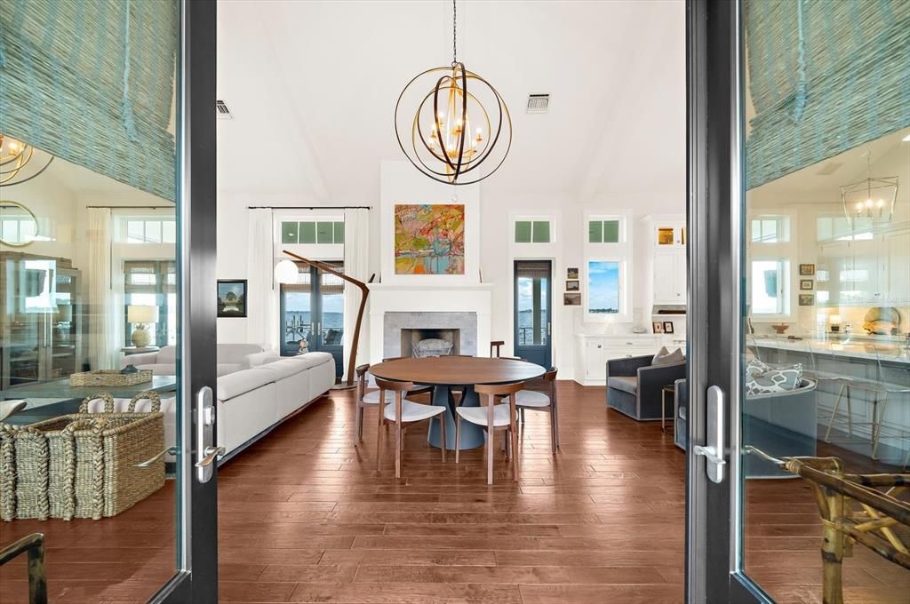 Chandelier, Dining room, Fireplace, Interior, Living room, Pendant Lights, Wood Texture Flooring