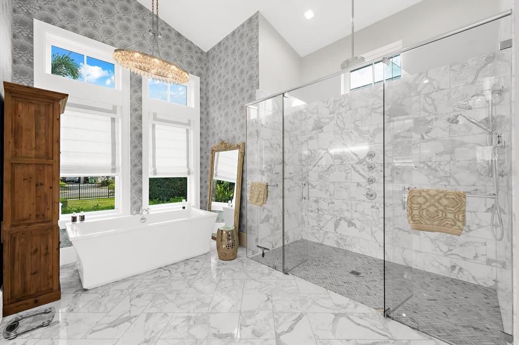 Bathroom, Chandelier, Free Standing Baths, Glass Shower, Interior, Marble, Marble Walls, Recessed Lighting