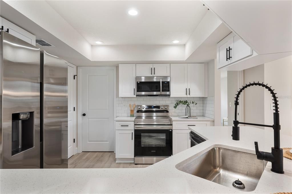 Interior, Kitchen, Recessed Lighting, Stainless Steel Appliances, Wood Texture Flooring