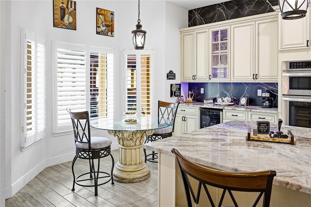 Dining room, Interior, Kitchen, Pendant Lights, Stainless Steel Appliances, Wood Texture Flooring