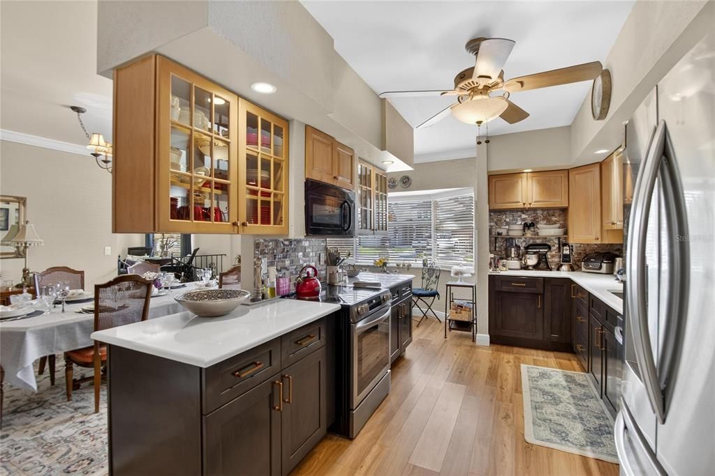 Dining room, Interior, Kitchen, Recessed Lighting, Stainless Steel Appliances, Wood Texture Flooring