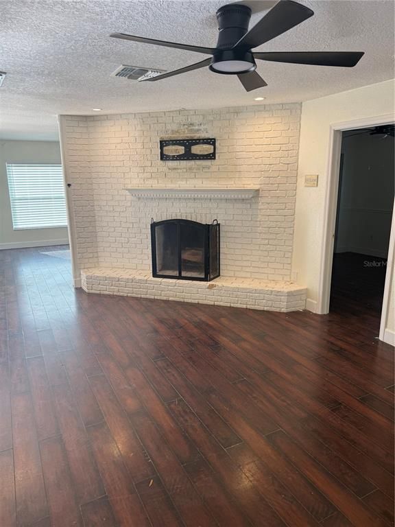 Empty room, Fireplace, Interior, Recessed Lighting, Stone Walls, Wood Texture Flooring