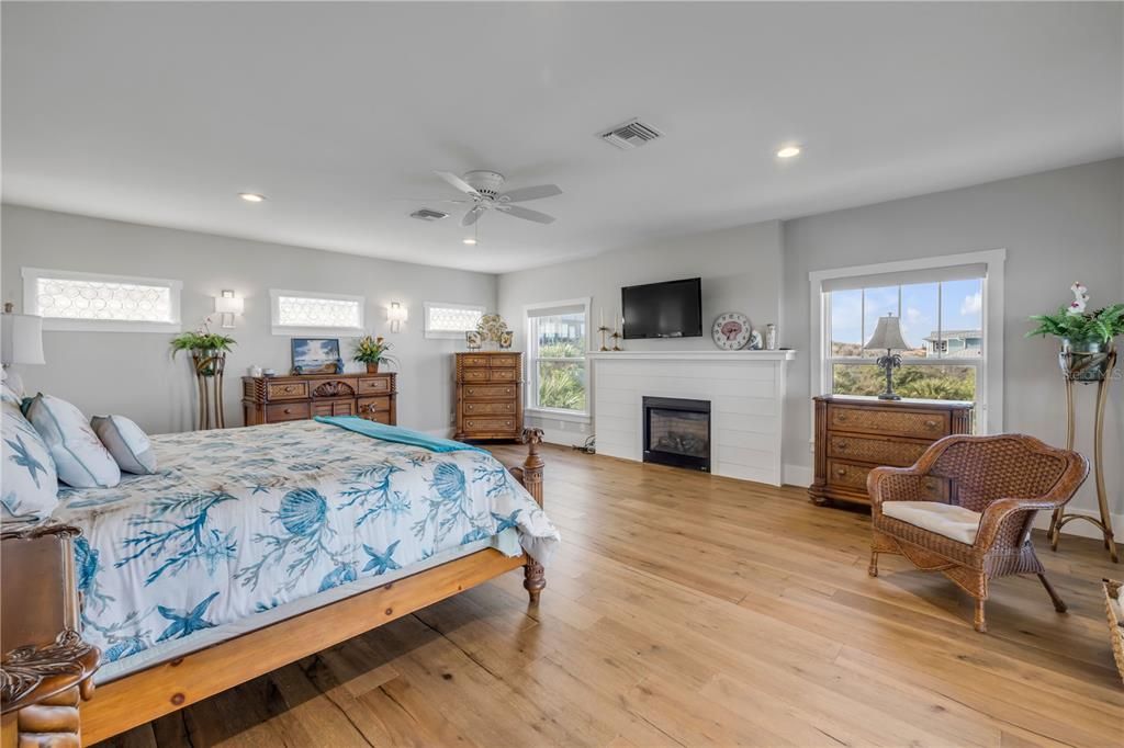 Bedroom, Fireplace, Interior, Recessed Lighting, Wood Texture Flooring