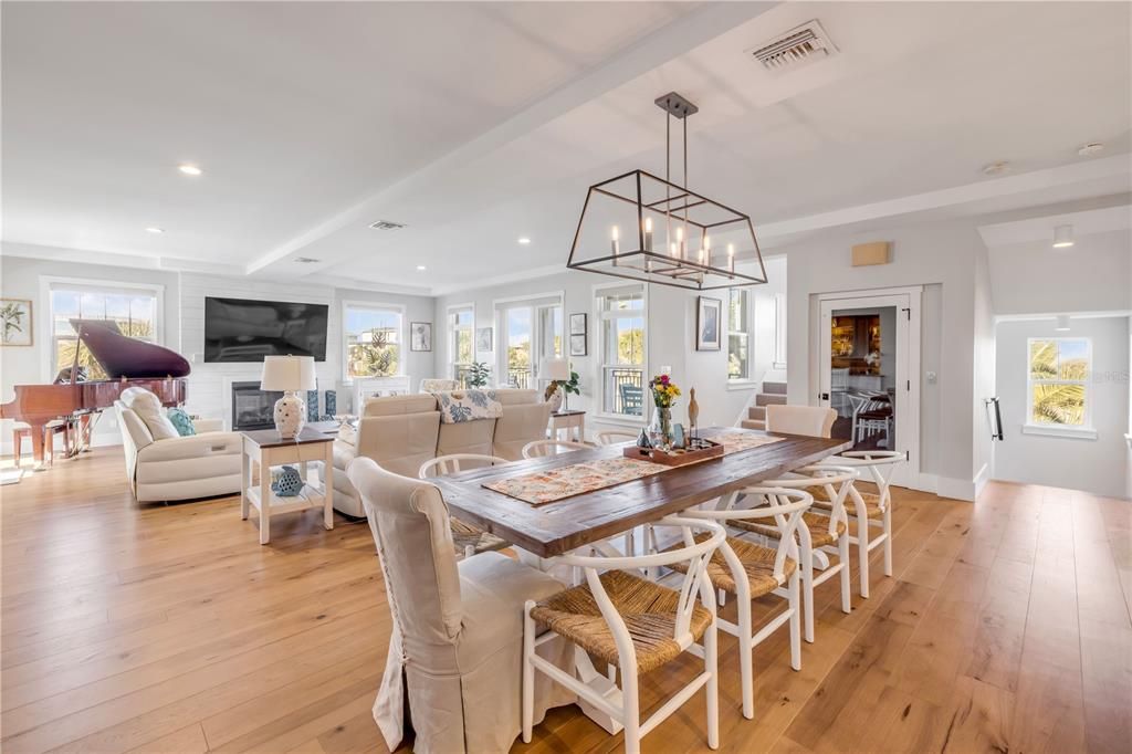 Dining room, Fireplace, Interior, Living room, Pendant Lights, Piano, Recessed Lighting, Wood Texture Flooring