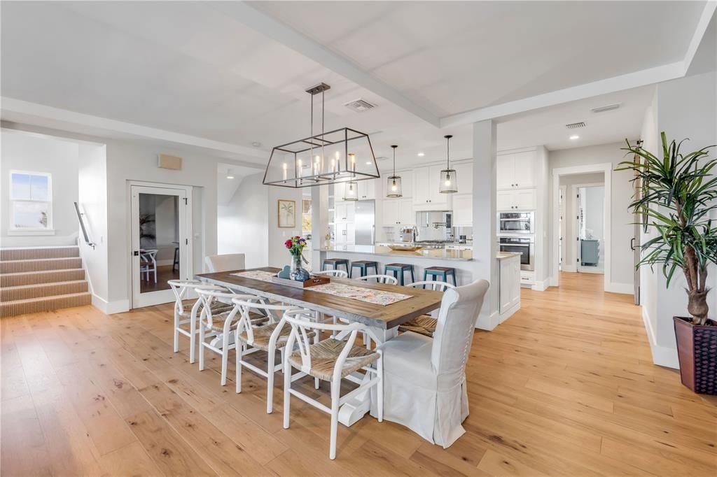 Dining room, Interior, Kitchen, Pendant Lights, Recessed Lighting, Stainless Steel Appliances, Wood Texture Flooring