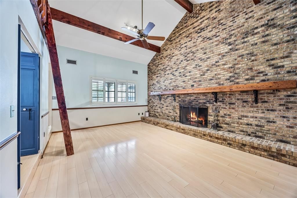 Empty room, Fireplace, Interior, Stone Walls, Wooden Beams, Wood Texture Flooring