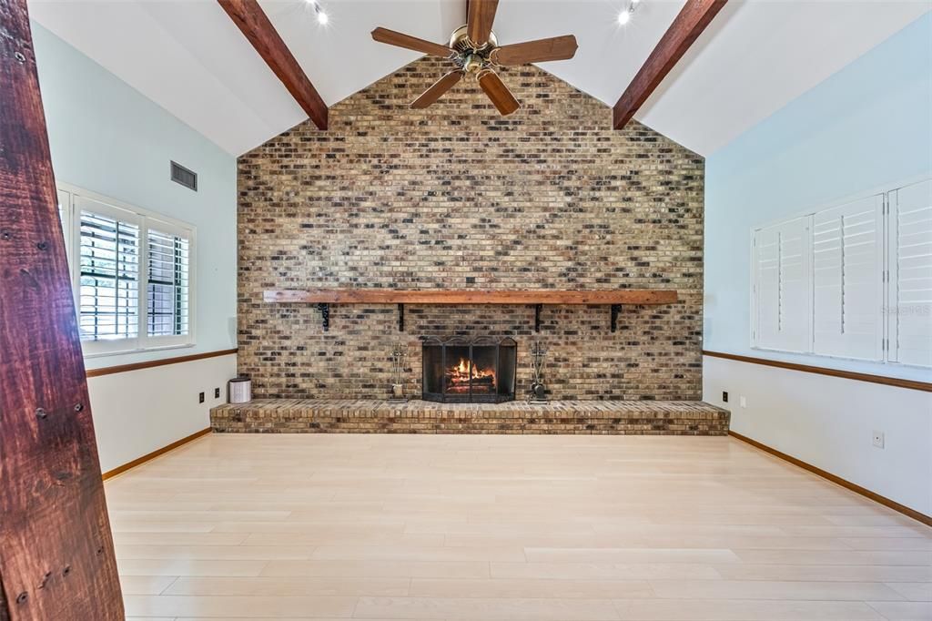 Empty room, Fireplace, Interior, Stone Walls, Wooden Beams, Wood Texture Flooring