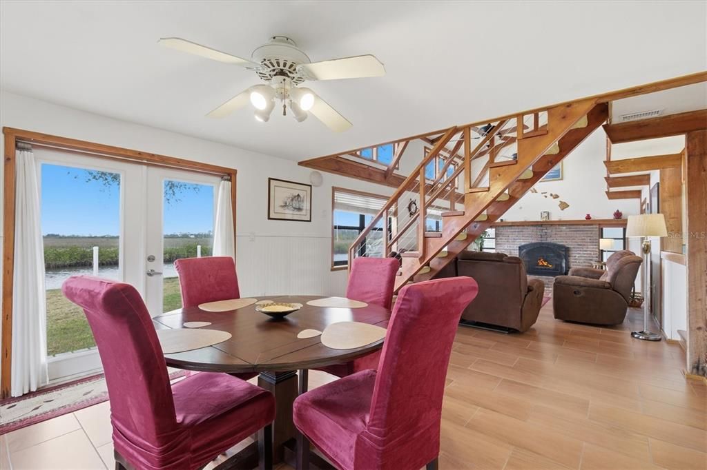 Dining room, Fireplace, Interior, Living room, Water, Wood Texture Flooring