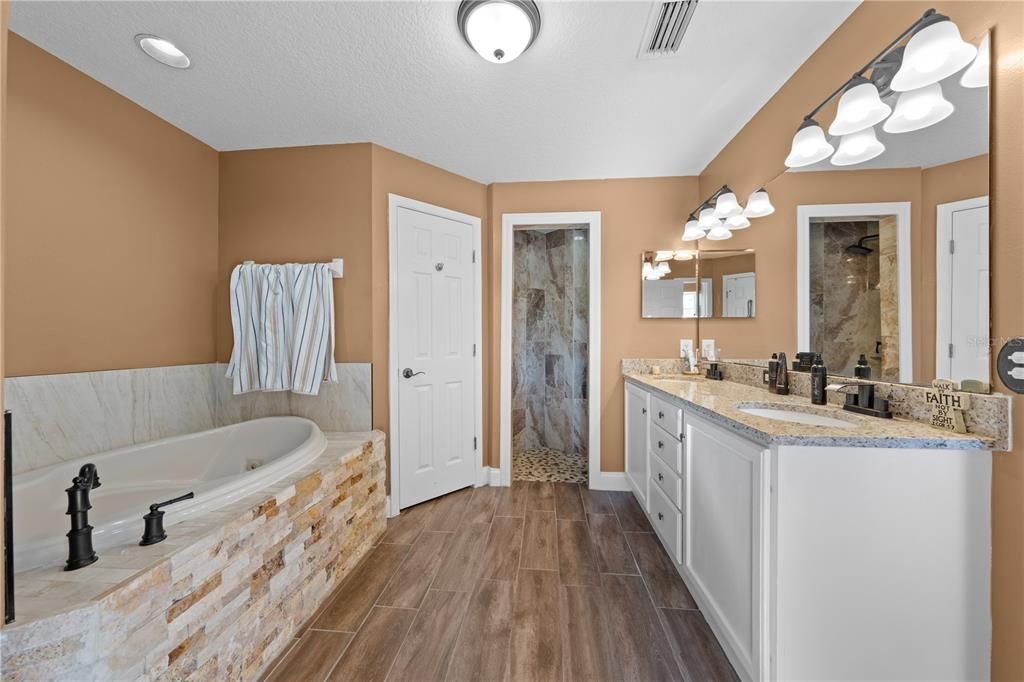 Bathroom, Dual Sink Vanities, Interior, Recessed Lighting, Wood Texture Flooring