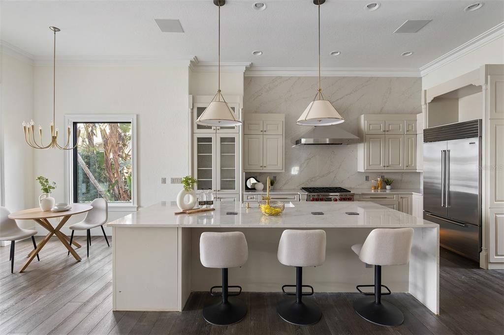Interior, Kitchen, Marble Walls, Pendant Lights, Recessed Lighting, Stainless Steel Appliances, Wood Texture Flooring