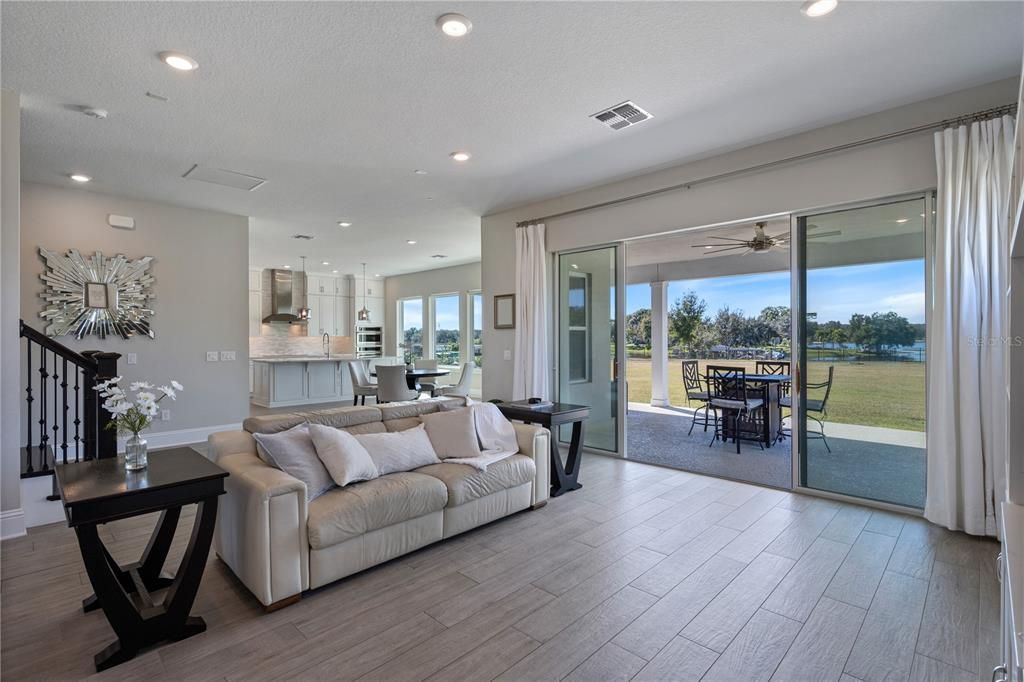 Dining room, Interior, Kitchen, Living room, Pendant Lights, Recessed Lighting, Water, Wood Texture Flooring