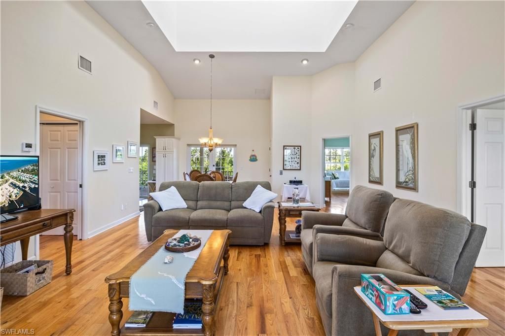 Chandelier, Dining room, Interior, Living room, Pendant Lights, Recessed Lighting, Wood Texture Flooring