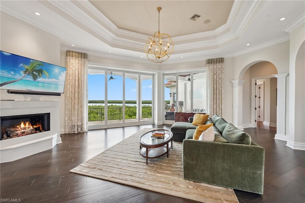 Chandelier, Fireplace, Interior, Living room, Recessed Lighting, Wood Texture Flooring
