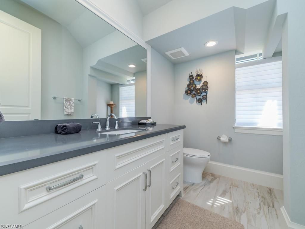 Bathroom, Dual Sink Vanities, Interior, Recessed Lighting, Wood Texture Flooring