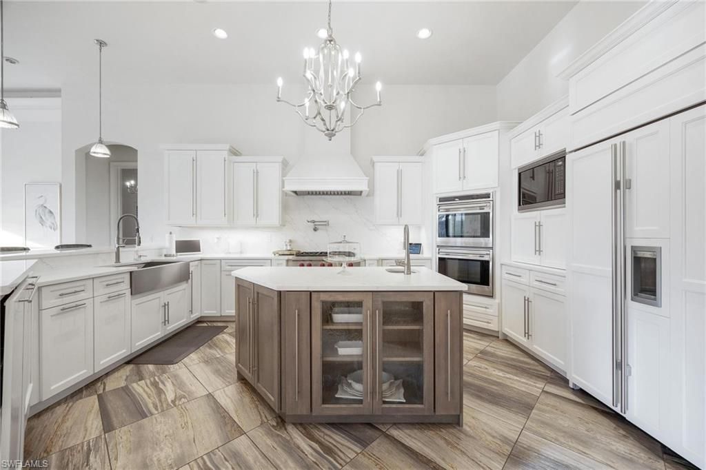 Chandelier, Interior, Kitchen, Pendant Lights, Recessed Lighting, Stainless Steel Appliances, Wood Texture Flooring